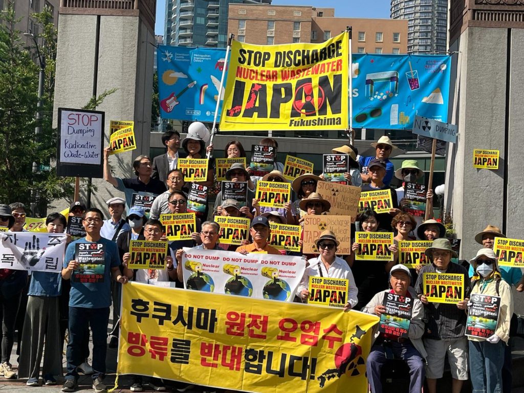 Protesters gather in Seattle to oppose the discharge of wastewater from the Fukushima Plant.