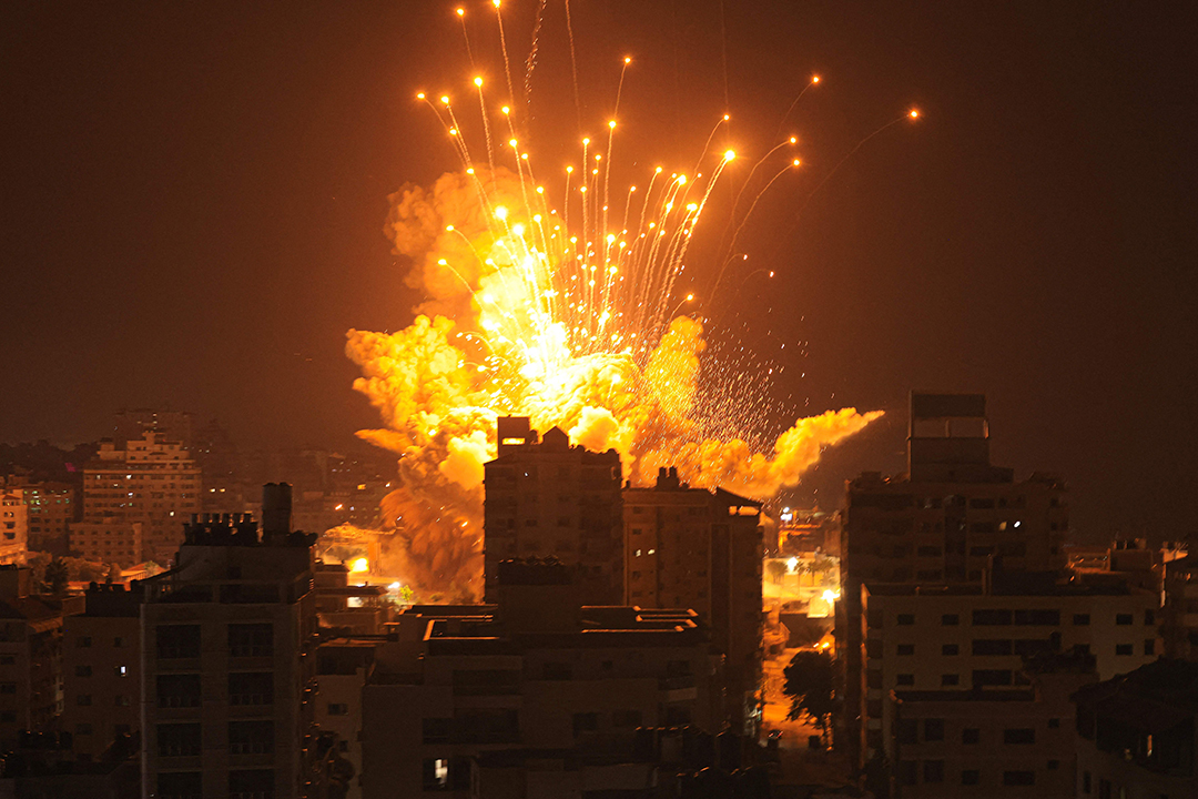 Image taken on October 8 of a missile exploding in Gaza city during an Israeli air strike.
