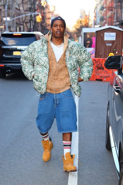 A guy who is very fitted up with the Timbs on.