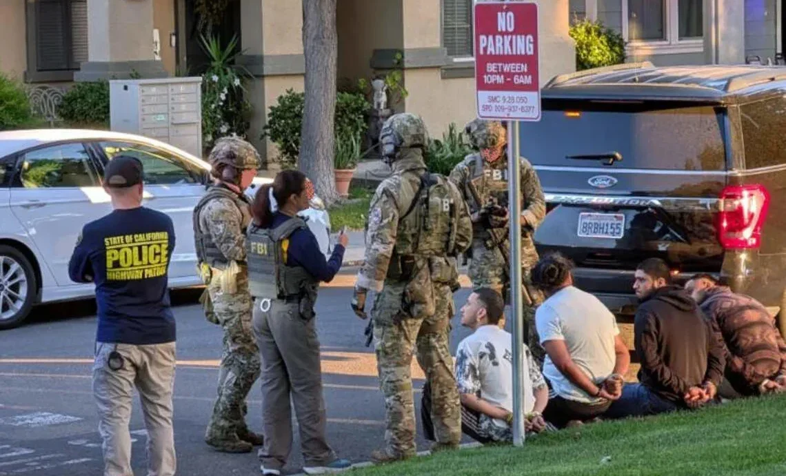 FBI and federal prosecutors announcing charges in Los Angeles against alleged crime syndicate members