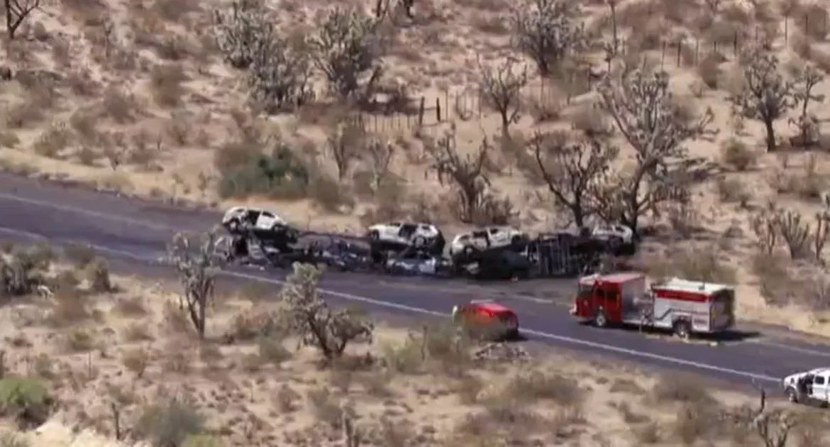 Investigators at a fiery crash scene along U.S. 93 near Wickenburg, Arizona