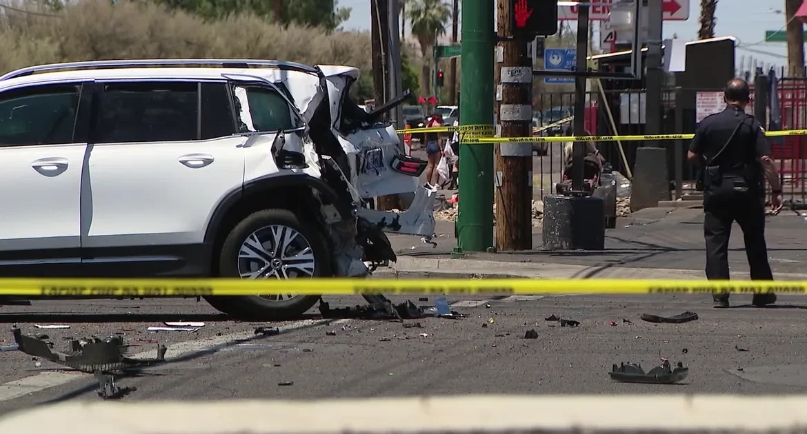 Police investigate a deadly seven-vehicle crash at a Phoenix intersection